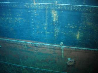 Ship's side in vicinity of well deck